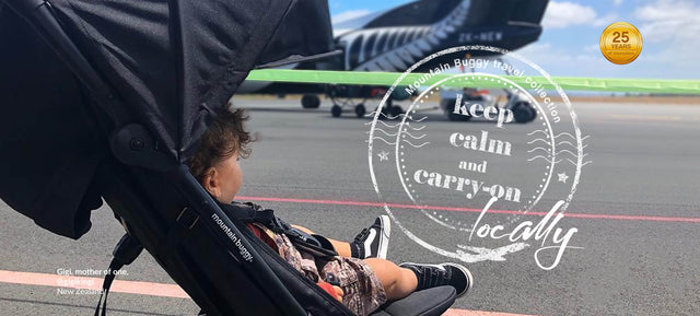 toddler in nano single buggy at airport keeping calm and carrying on