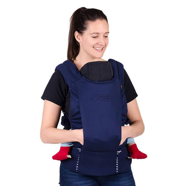 mountain buggy juno baby carrier in nautical blue colour with infant insert in use_nautical
