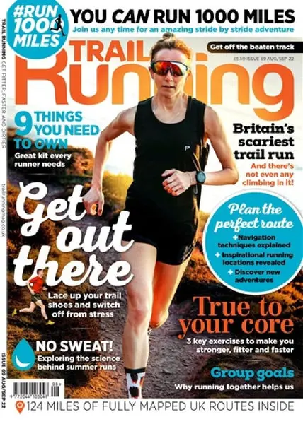 Julia Davis running on scenic track for photography shoot for the front cover of Trail Running Magazine