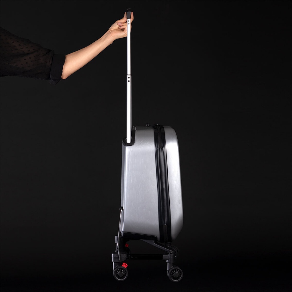 Mountain Buggy skyrider luxury being held in air with one hand to demonstrate lightweight construction_silver