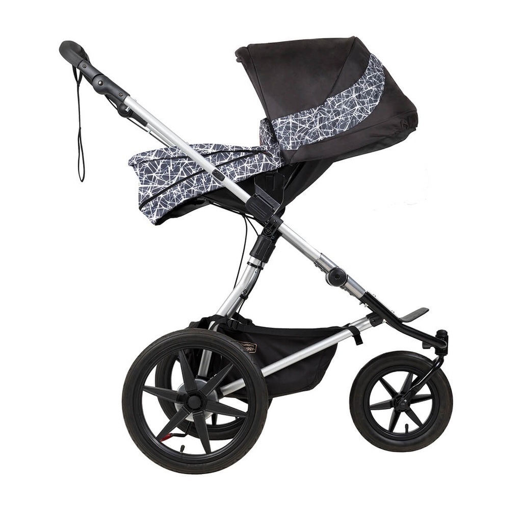 carrycot plus on terrain in graphite parent facing side view